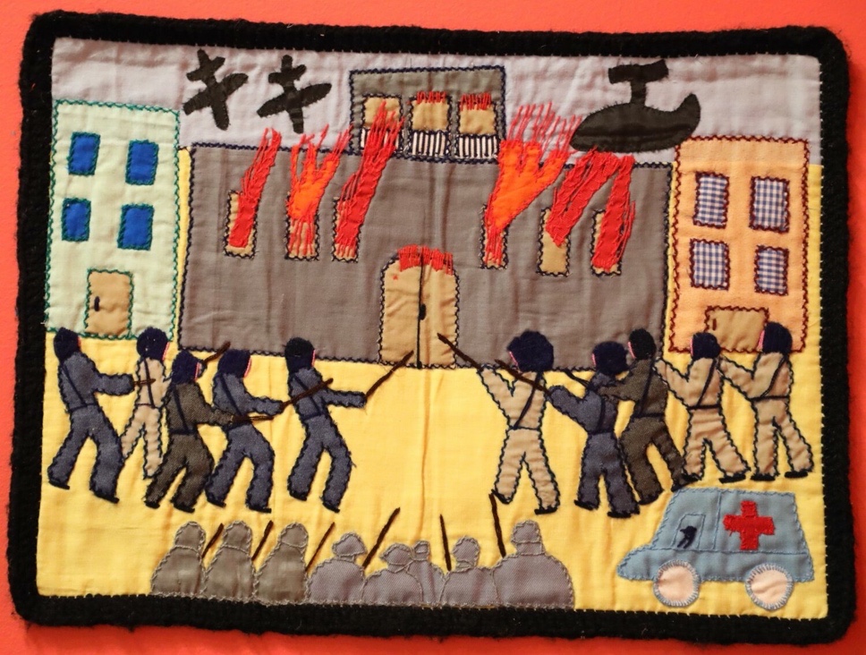 Figure 1. E.M and F.D.D, The Coup, embroidered textile, 15x19.75 inches, 1986, Museum of Latin American Art, Long Beach, California