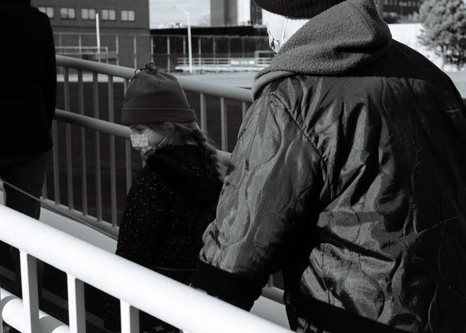 Child with family, Toronto. “I’ve never seen a child tied to a skipping rope walking around a track with their parents. After a few laps the family left”. Malcolm